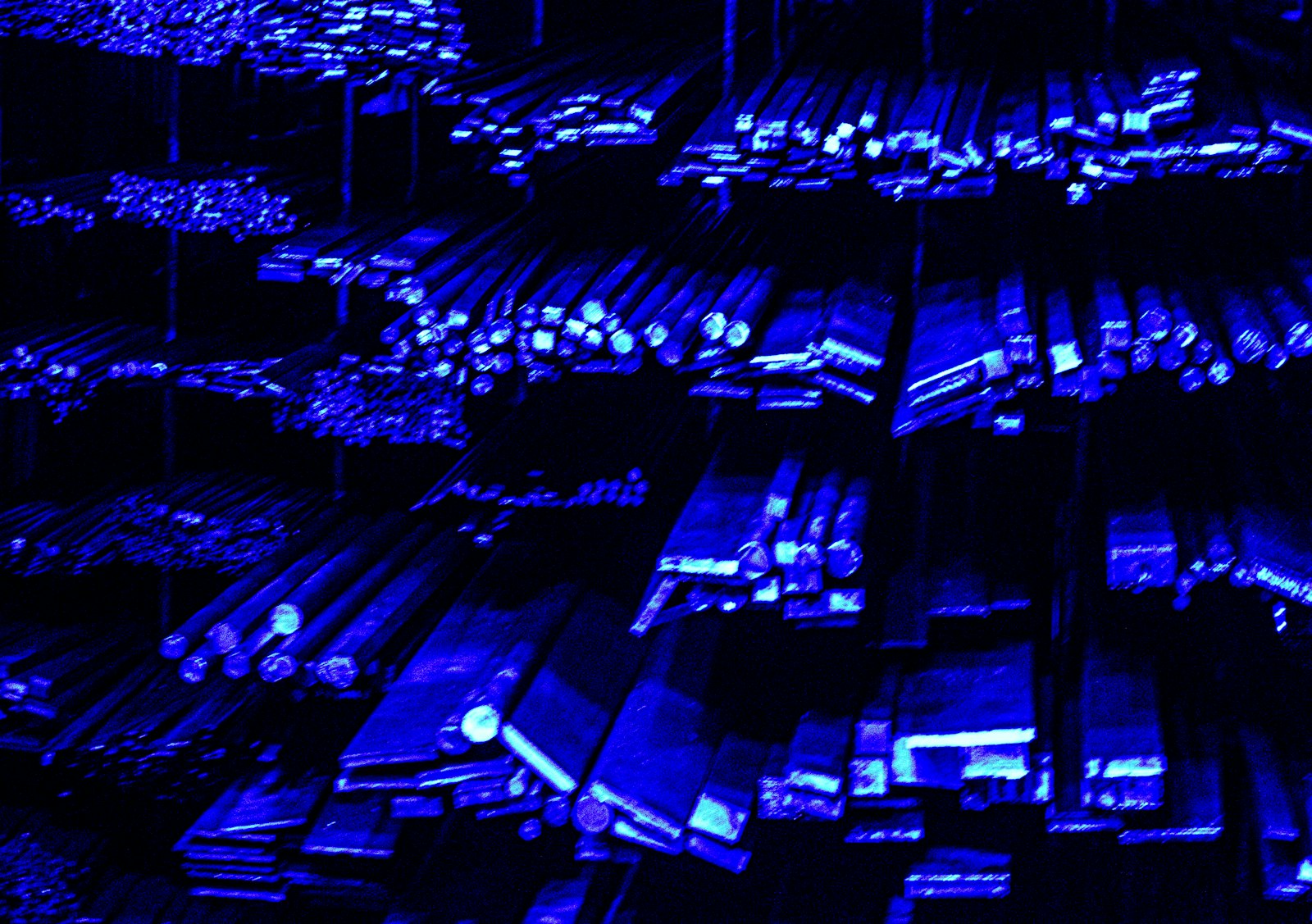 Rows of illuminated blue server infrastructure, representing sovereign on-premises AI capabilities consultancies use to win regulated enterprise RFPs